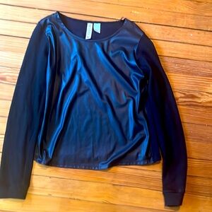 Women’s black sweater with faux leather front